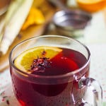 lemongrass hibiscus tea with orange peel and maple syrup