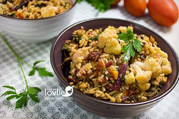 harissa spiced tomato fried rice with beetroot greens