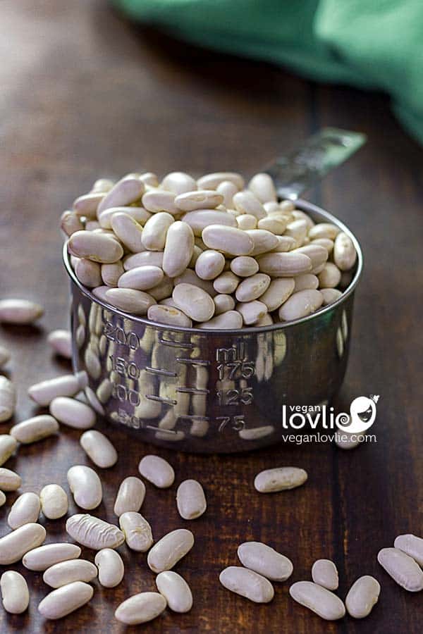 White kidney beans in a measuring cup